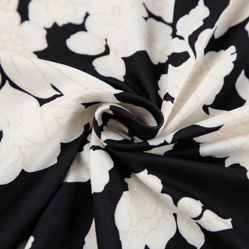 Dame elegant bluse- og kjolesæt med floralt mønster og detaljerede ærmeafslutninger Stilla