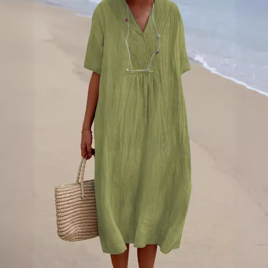 Dame afslappet midikjole med V-udskæring og sidelommer Stilla