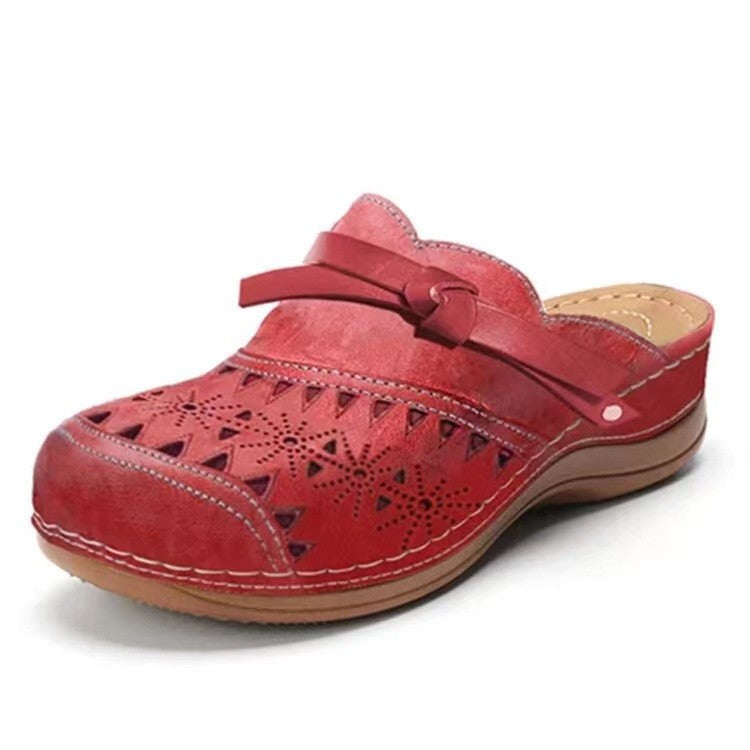 Dame Komfortable Clogs med filigran gennembruddesign og elegant rem Stilla