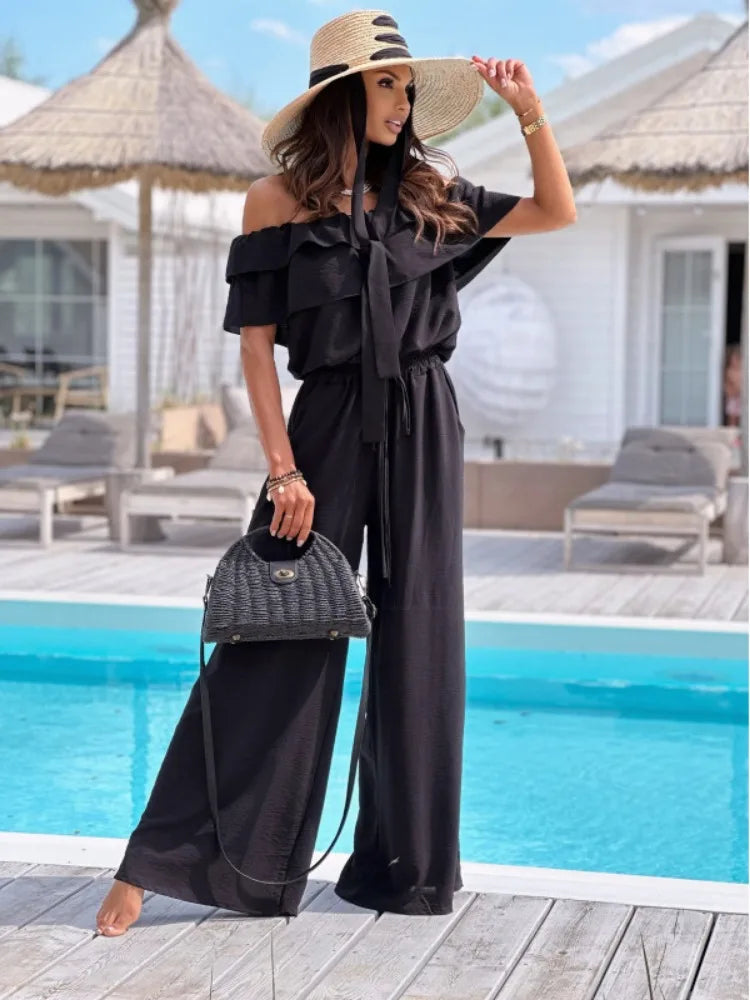 Stilla | Afslappet Off the Shoulder Kortærmet Jumpsuit