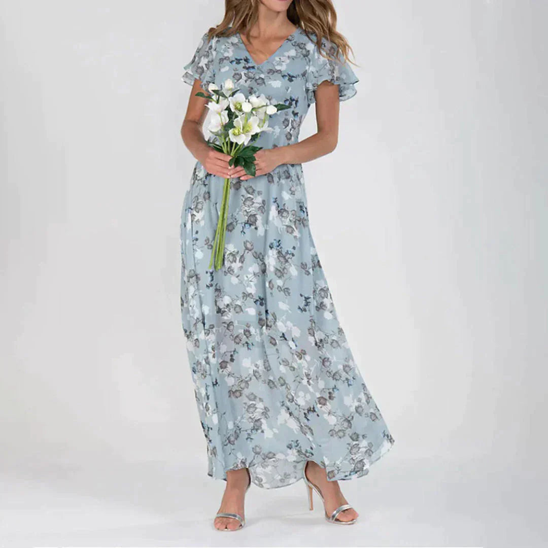 Stilla | Elegant blomsterkjole til festlige begivenheder