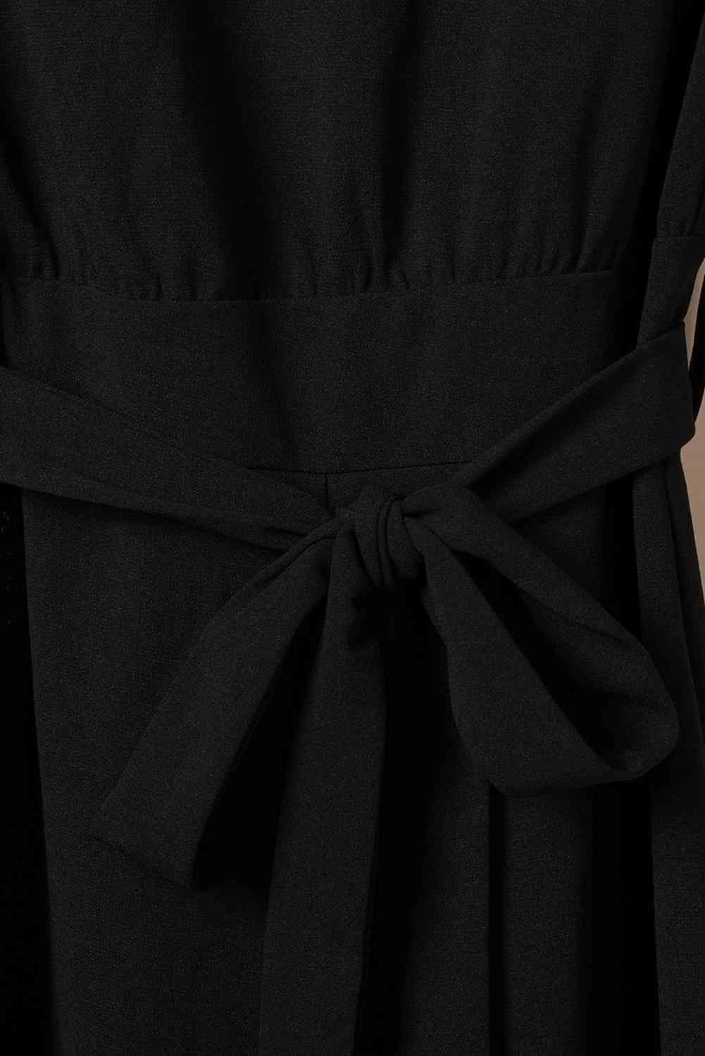 Stilla | Halstie bælte jumpsuit