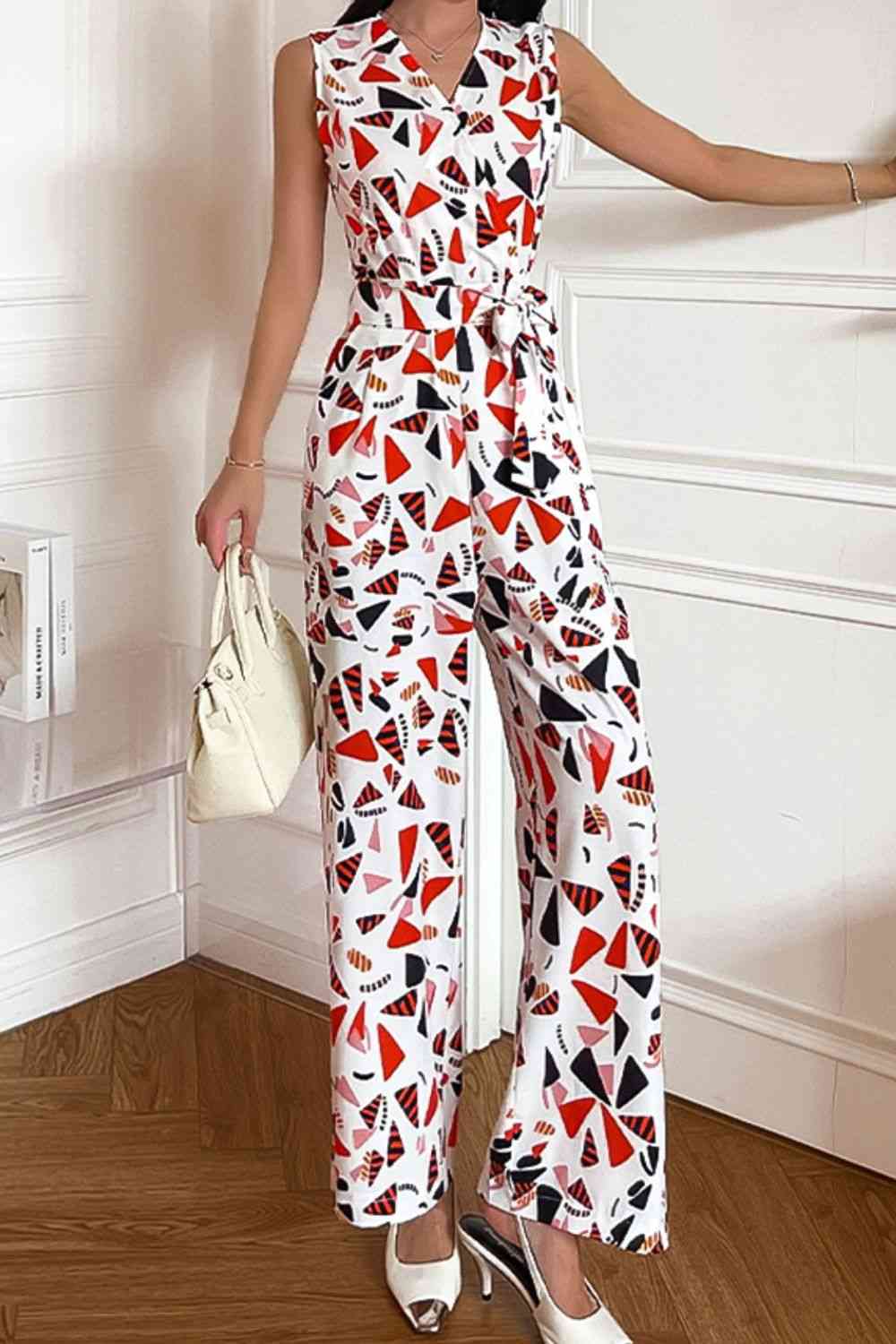 Stilla | Surplice hals ærmeløs jumpsuit
