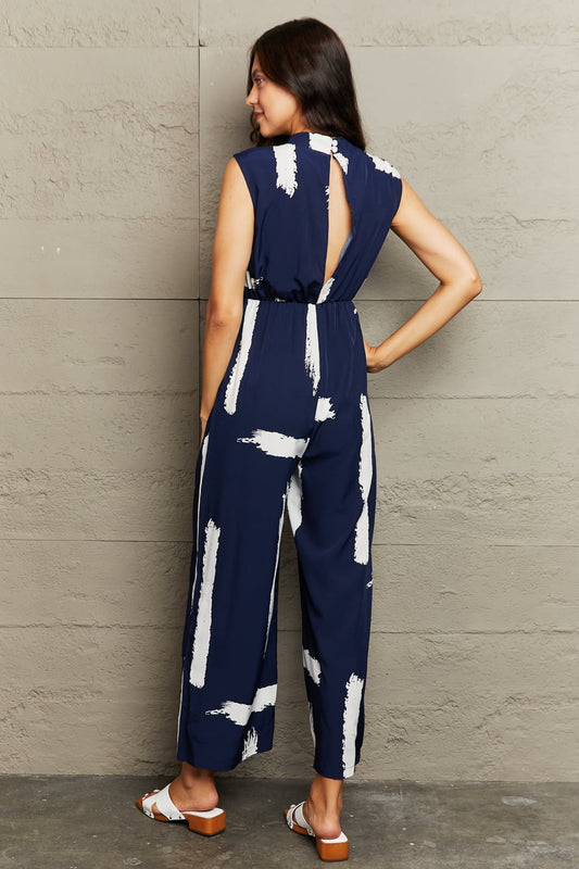 Stilla | Rund hals udsnit jumpsuit med lommer