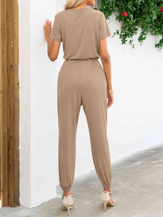 Stilla | Ærme V-hals Jumpsuit Med Lommer