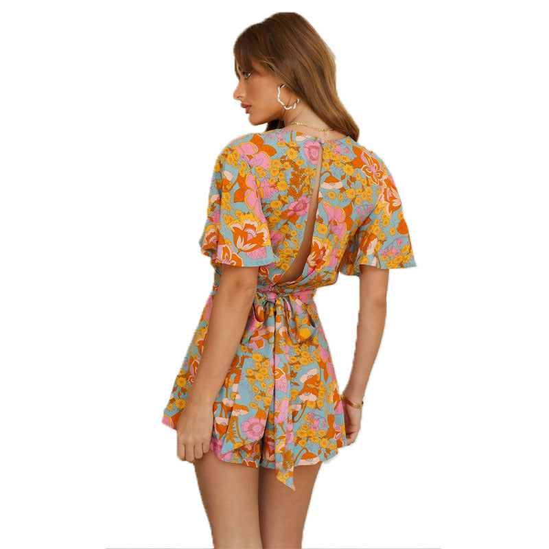 Stilla | Læder Jumpsuit med florale mønstre til kvinder, udskæring, korte ærmer, floralt mønster