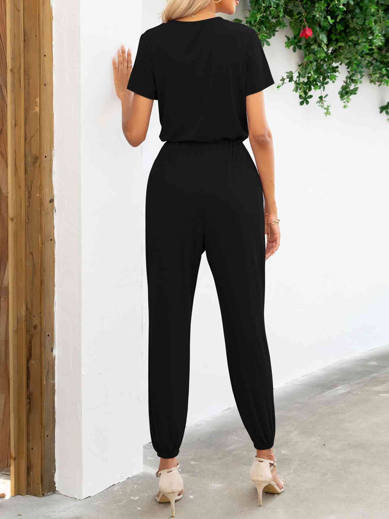 Stilla | Ærme V-hals Jumpsuit Med Lommer