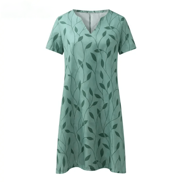 Stilla | Vibrerende, Elegant Kjole. Stilfuld Print Med V-Hals