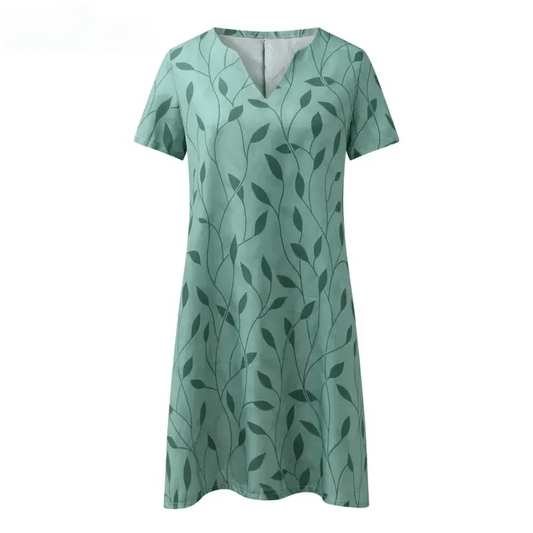 Stilla | Vibrerende, Elegant Kjole. Stilfuld Print Med V-Hals