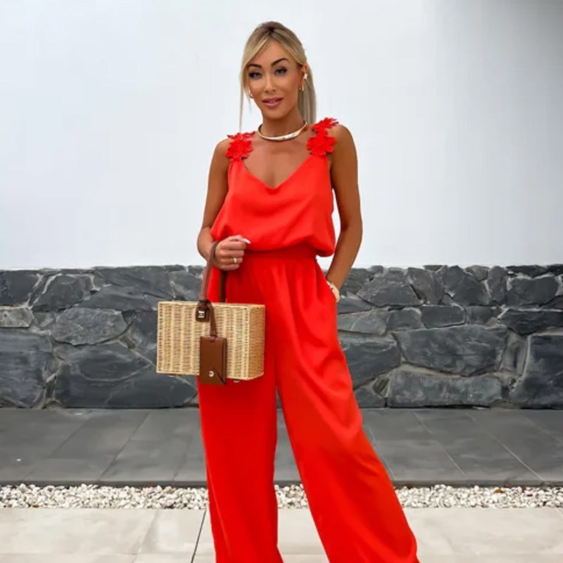 Stilla | Jumpsuit Med Brede Ben og Blomstrede Skuldre