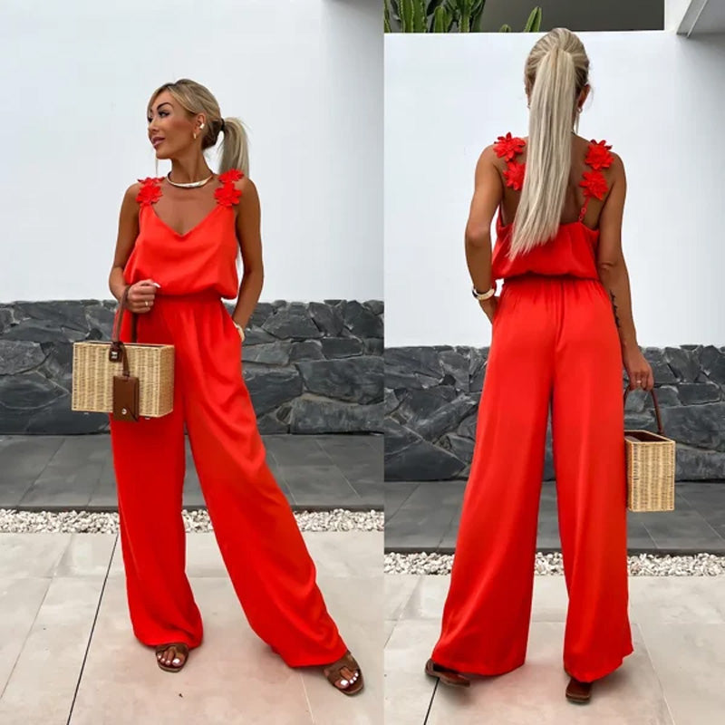 Stilla | Jumpsuit Med Brede Ben og Blomstrede Skuldre