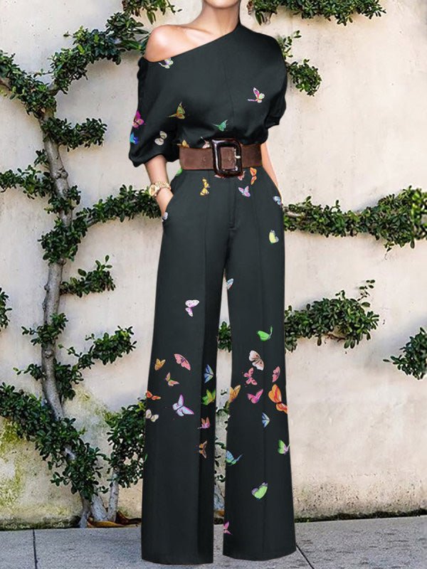 Stilla | Bred Ben Jumpsuit med Skrå Skulder og Print