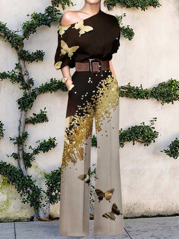 Stilla | Bred Ben Jumpsuit med Skrå Skulder og Print